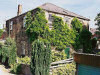 Tucked away out of sight up an alleyway off Bridge Street is this former Baptist Chapel. The Baptist cause at Belper was introduced in 1817 by the friends at Duffield, and continued as a branch of Duffield until 1823. The meetings were held in a room at the George and Dragon on Bridge Street and on August 24th 1817 it was opened for public worship by Brother Ingram, who acted as their minister. An appeal for a Chapel and Burying Ground at Belper was launched the next year and Mr Hardy gave land for the chapel seen here, built in 1819. It is now a Guest House.